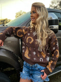 A cowgirls sweater